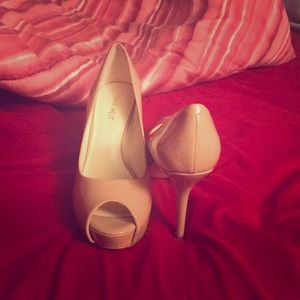 Tan peep hole heels